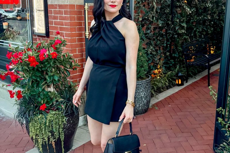A Black Halter Romper with Refined Accessories for Evening Plans